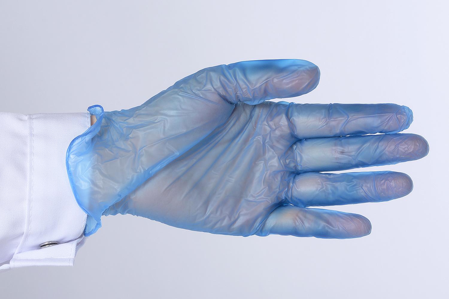 Перчатки одноразовые виниловые голубые неопудренные. Фото �2